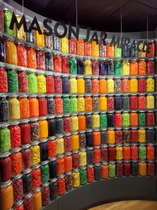 multiple shelves of canning jars