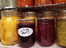 home-canned fruits in glass jars