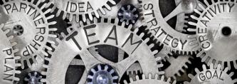 gears with the words team; plan; strategy