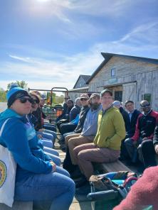 participants touring an apple orchard