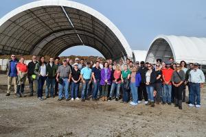 group touring the composting facility