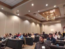 large group watching a presentation