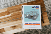 pack shed handbook on a wooden table