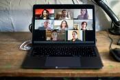 computer screen with eight participants in an online meeting