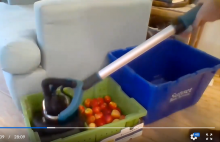 cleaning a bin with a sander