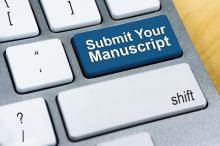 computer keyboard with the phrase "submit your manuscript"